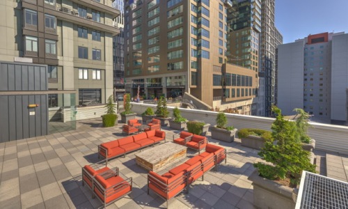 rendering of an open air lounge located on a rooftop